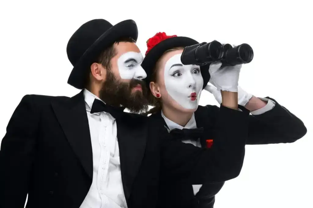 Two memes as business people looking through binoculars